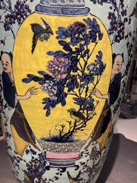 A very large Chinese famille rose turquoise-ground vase and cover, 19th C.